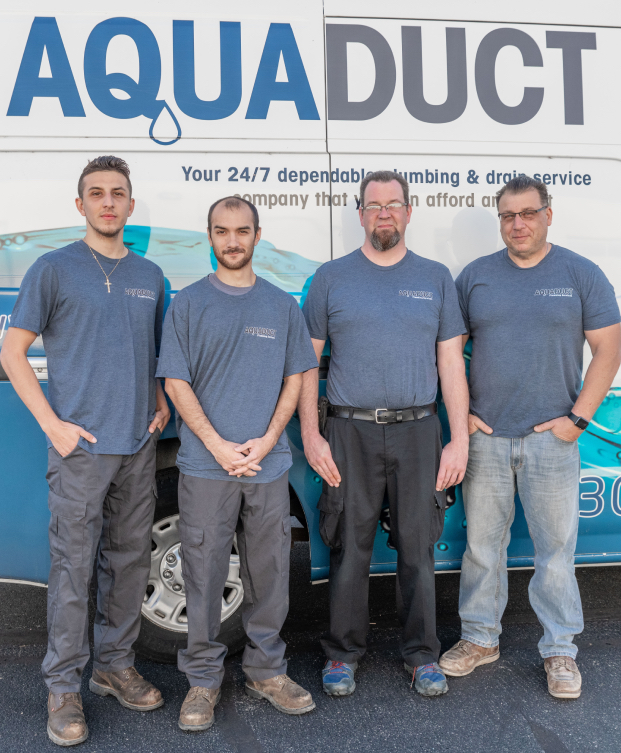 Aurora Plumber - Staff in front of truck